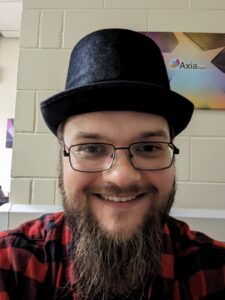 man smiling wearing hat